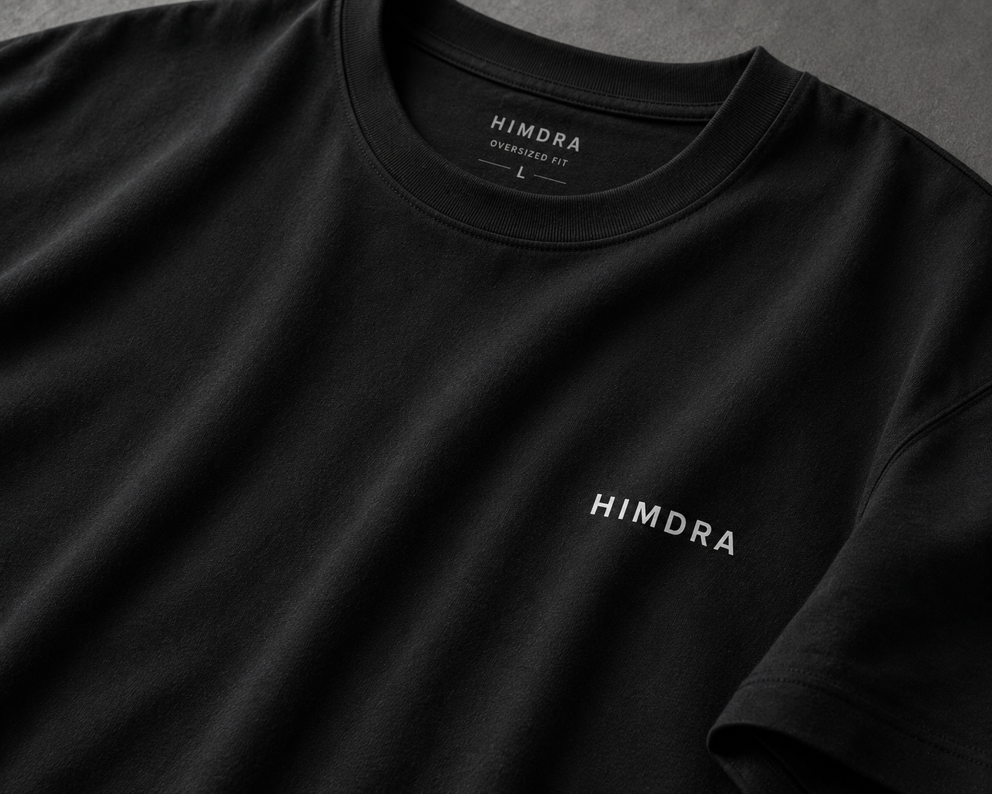 Black t-shirt with 'HIMDRA' logo on a dark background