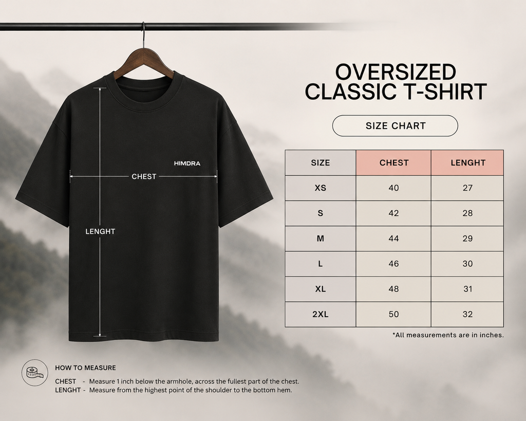 Black oversized classic t-shirt on a hanger with size chart on a gray background