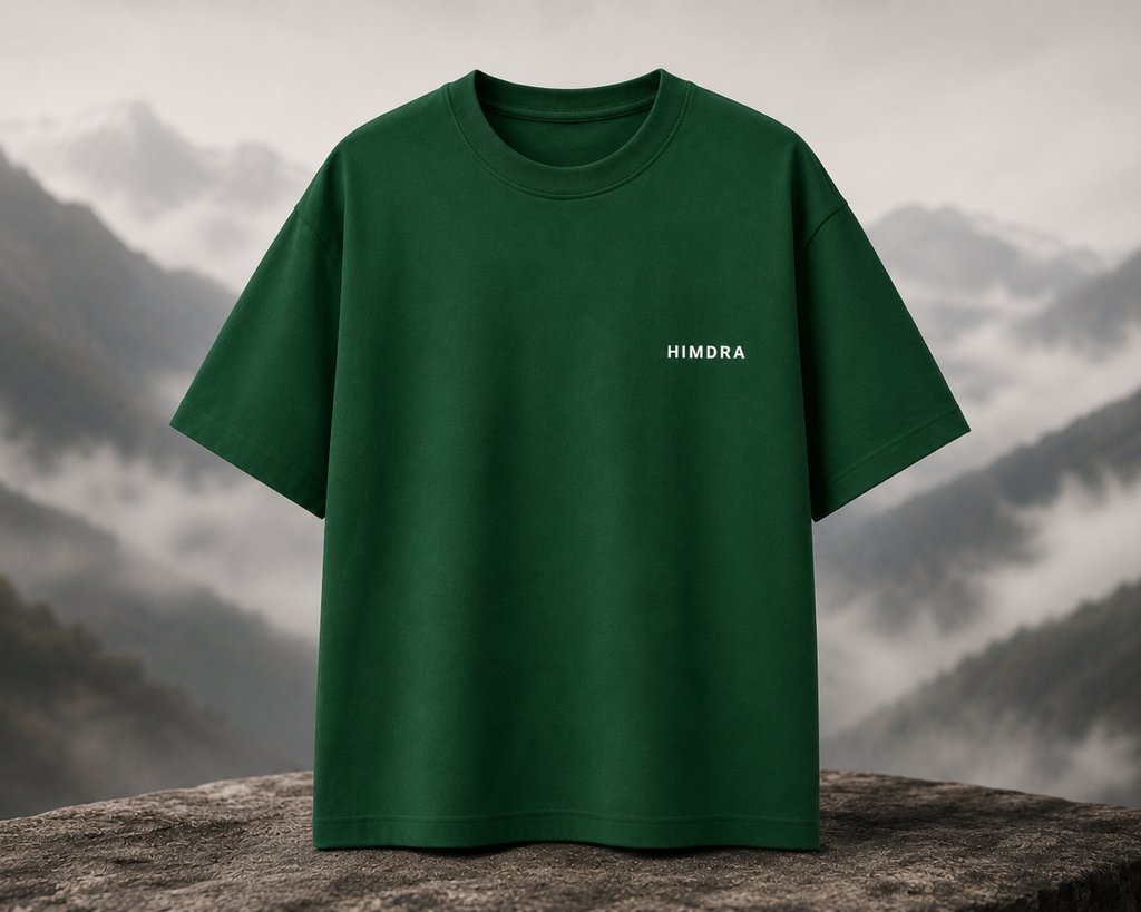 Green t-shirt with 'HIMDRA' logo on a mountain background